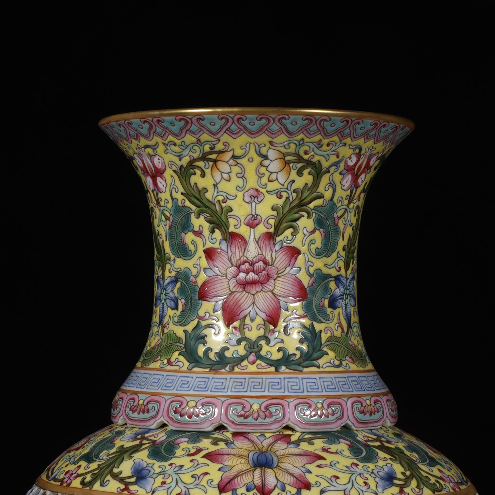Qing Dynasty Qianlong yellow ground pastel painted gold-wrapped lotus flower hollow chilong revolving vase