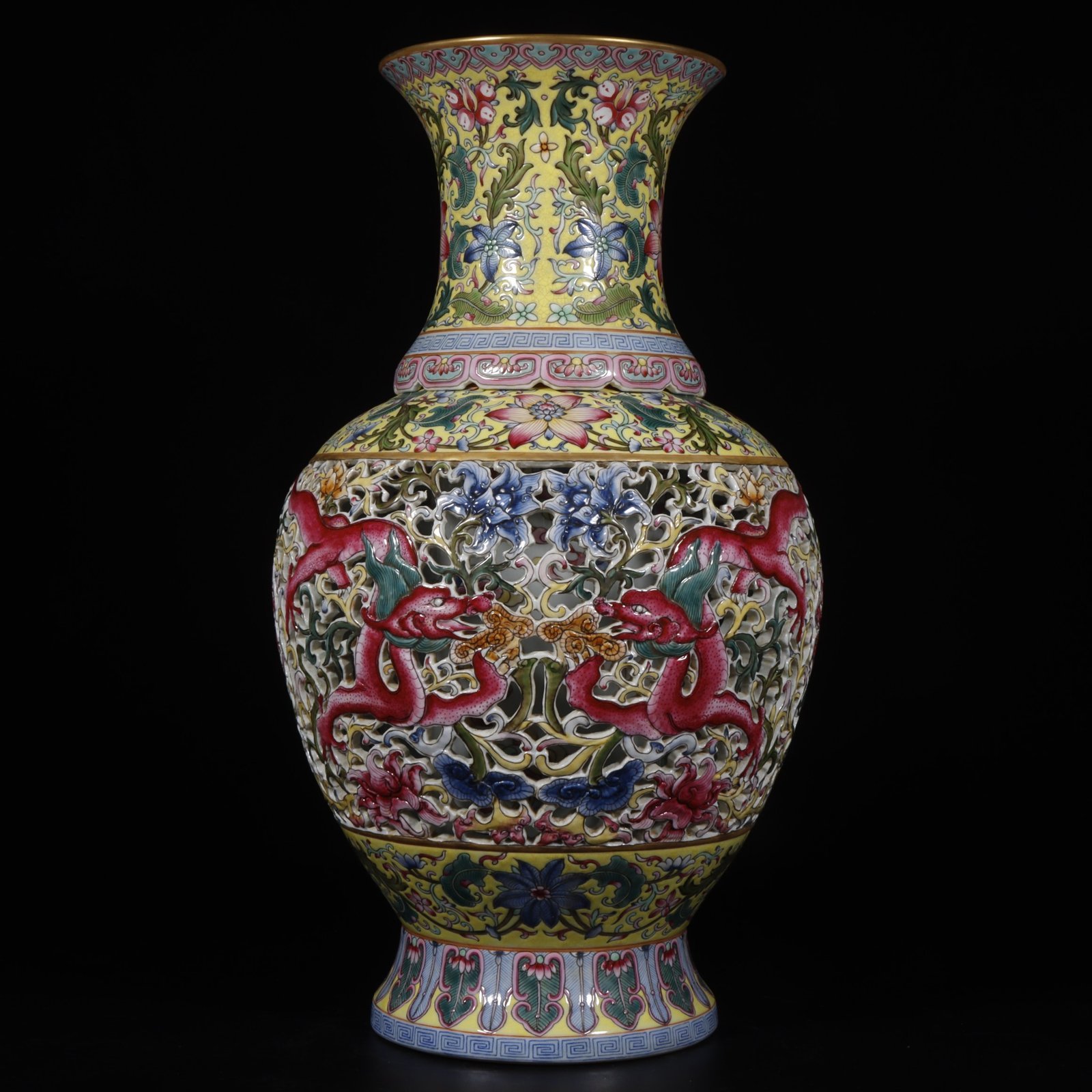 Qing Dynasty Qianlong yellow ground pastel painted gold-wrapped lotus flower hollow chilong revolving vase