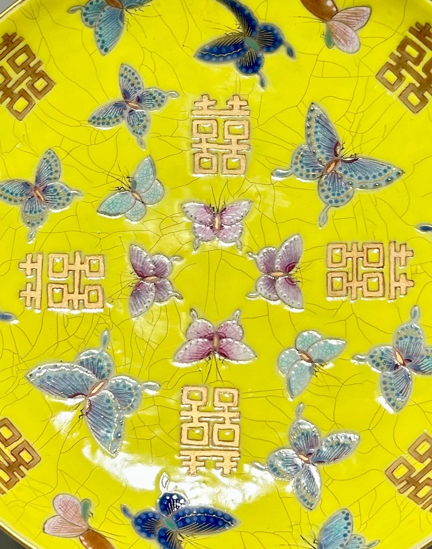 Qing Dynasty official kiln yellow ground pastel butterfly wedding plate