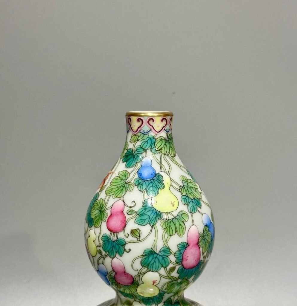 Qing Dynasty Qianlong pastel colored Fu Lu Shou gourd vase