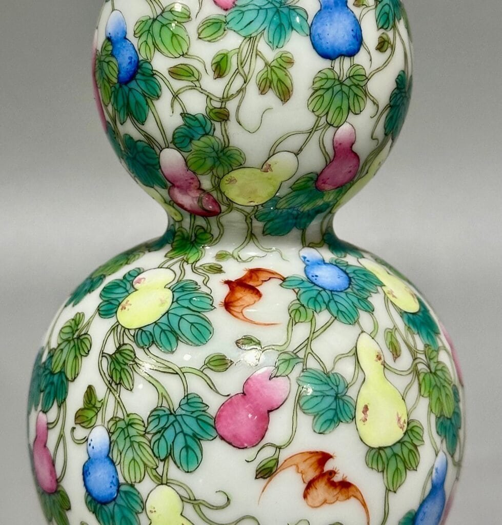 Qing Dynasty Qianlong pastel colored Fu Lu Shou gourd vase
