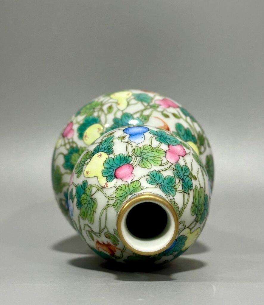 Qing Dynasty Qianlong pastel colored Fu Lu Shou gourd vase