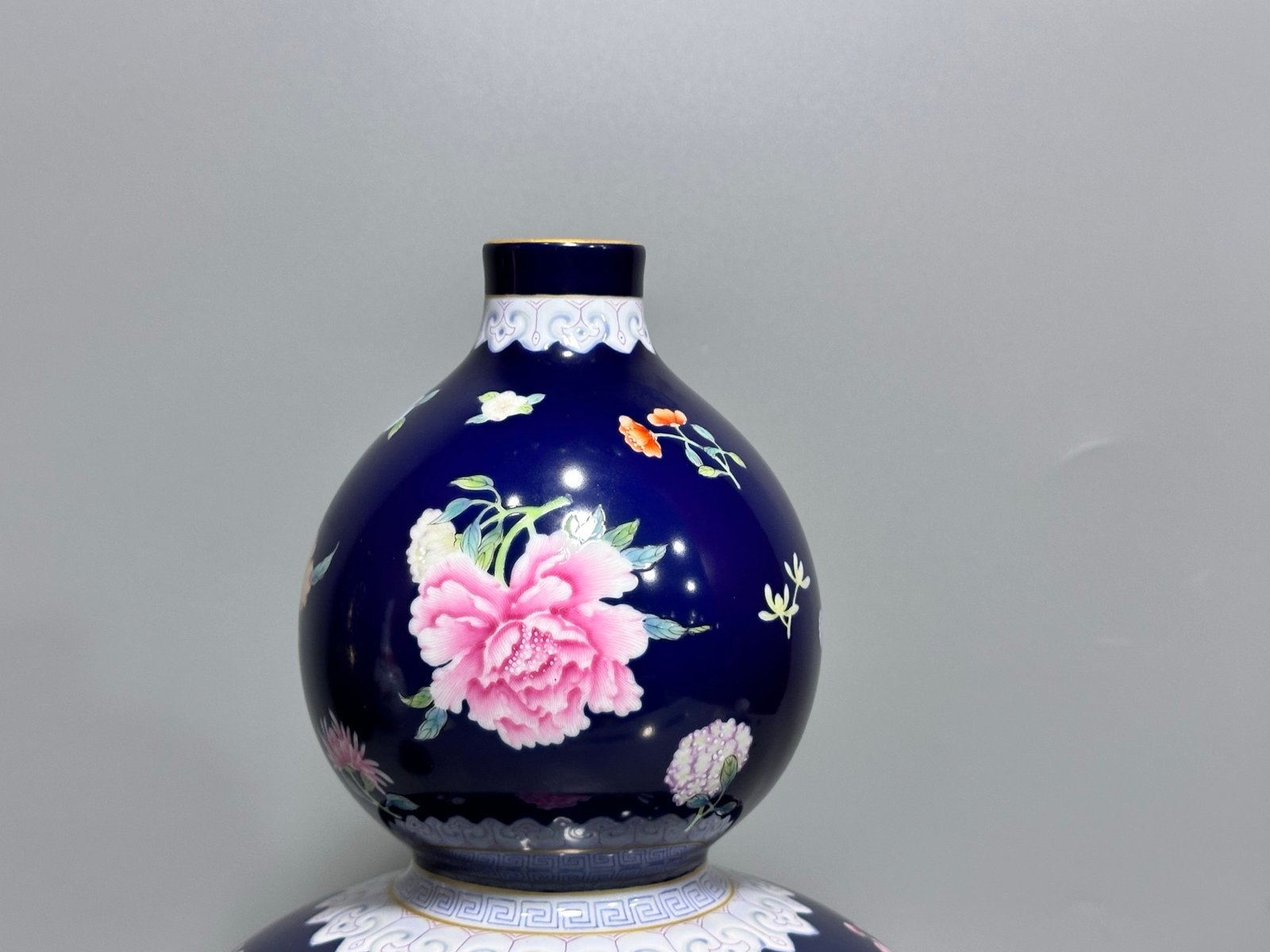 Qing Dynasty Qianlong blue-glazed pastel floral gourd vase
