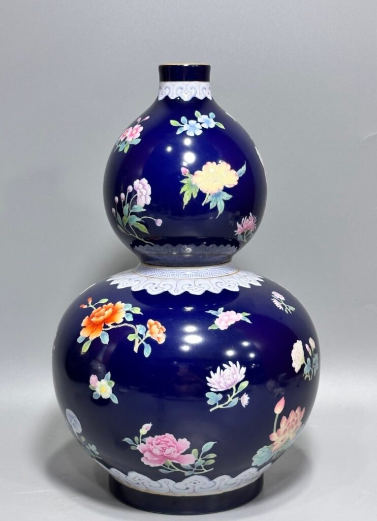Qing Dynasty Qianlong blue-glazed pastel floral gourd vase