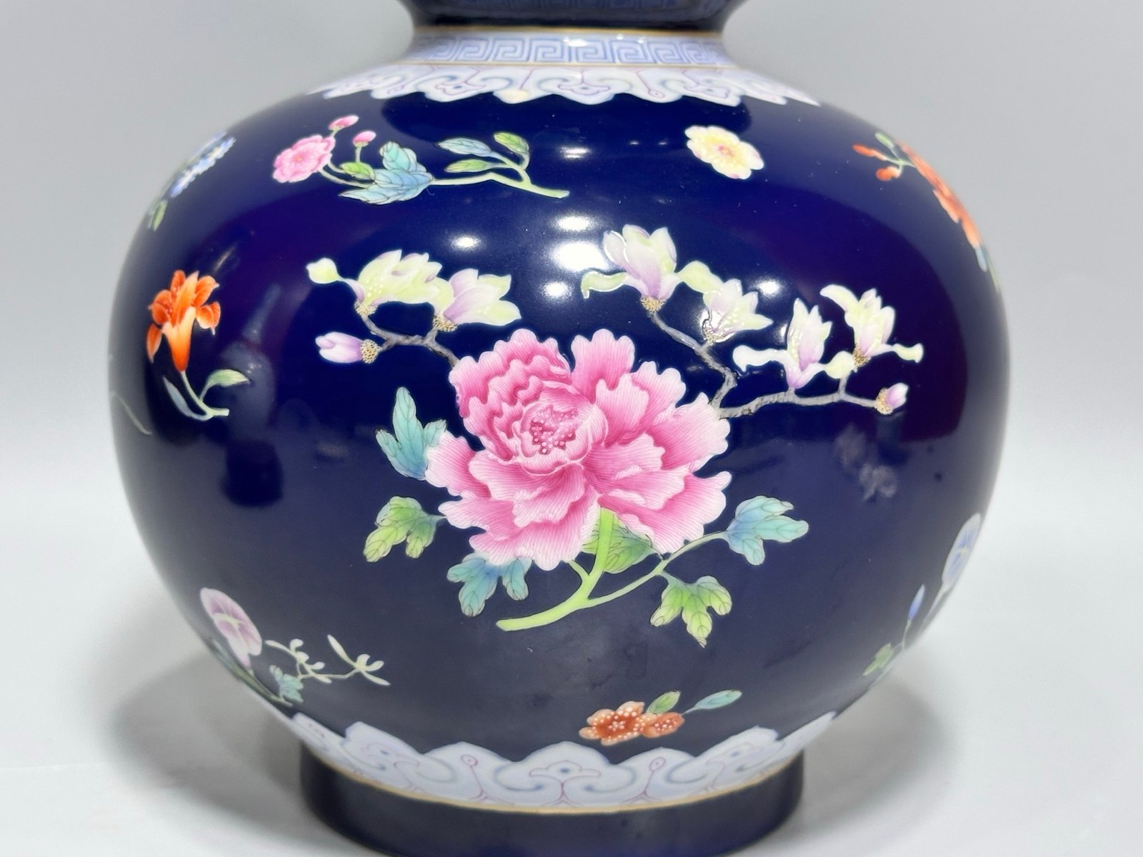 Qing Dynasty Qianlong blue-glazed pastel floral gourd vase