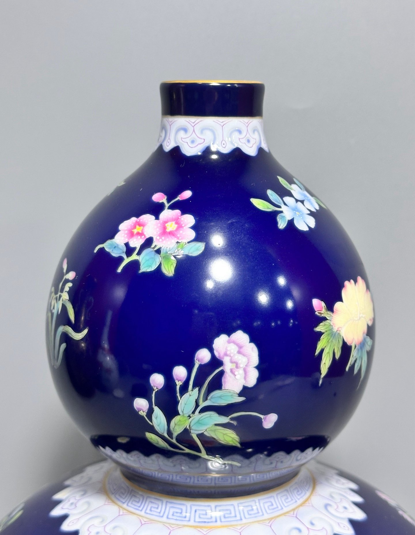 Qing Dynasty Qianlong blue-glazed pastel floral gourd vase
