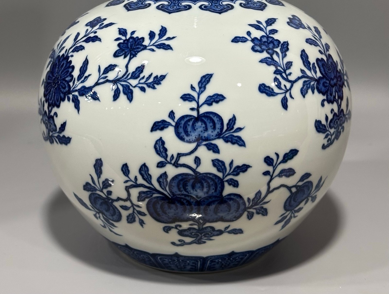 Qing Dynasty Qianlong blue and white three-fruit celestial sphere vase
