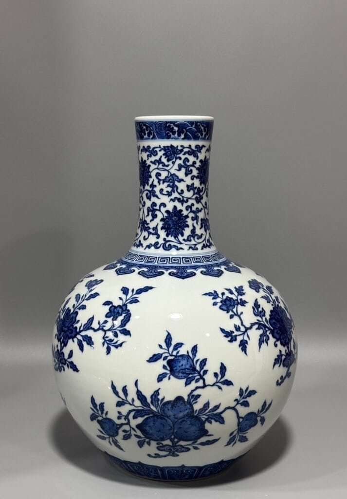 Qing Dynasty Qianlong blue and white three-fruit celestial sphere vase
