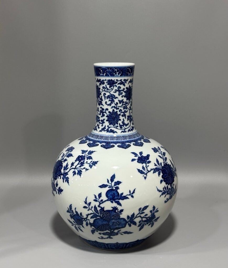 Qing Dynasty Qianlong blue and white three-fruit celestial sphere vase