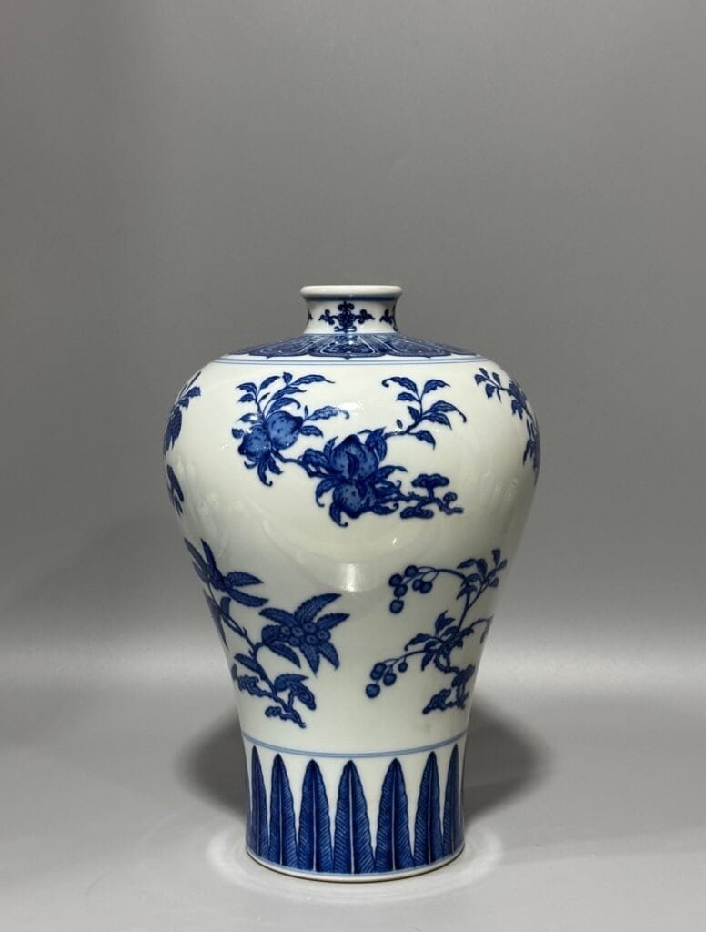 Qing Dynasty Qianlong blue and white plum vase