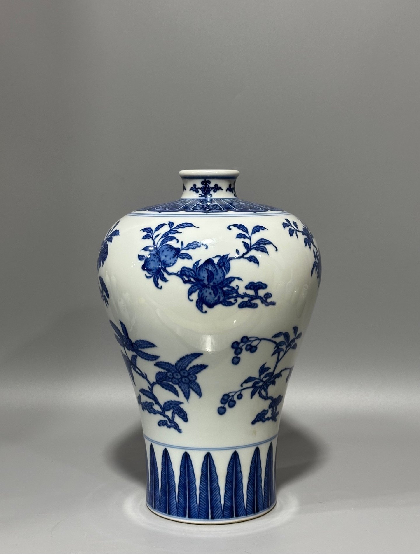 Qing Dynasty Qianlong blue and white plum vase
