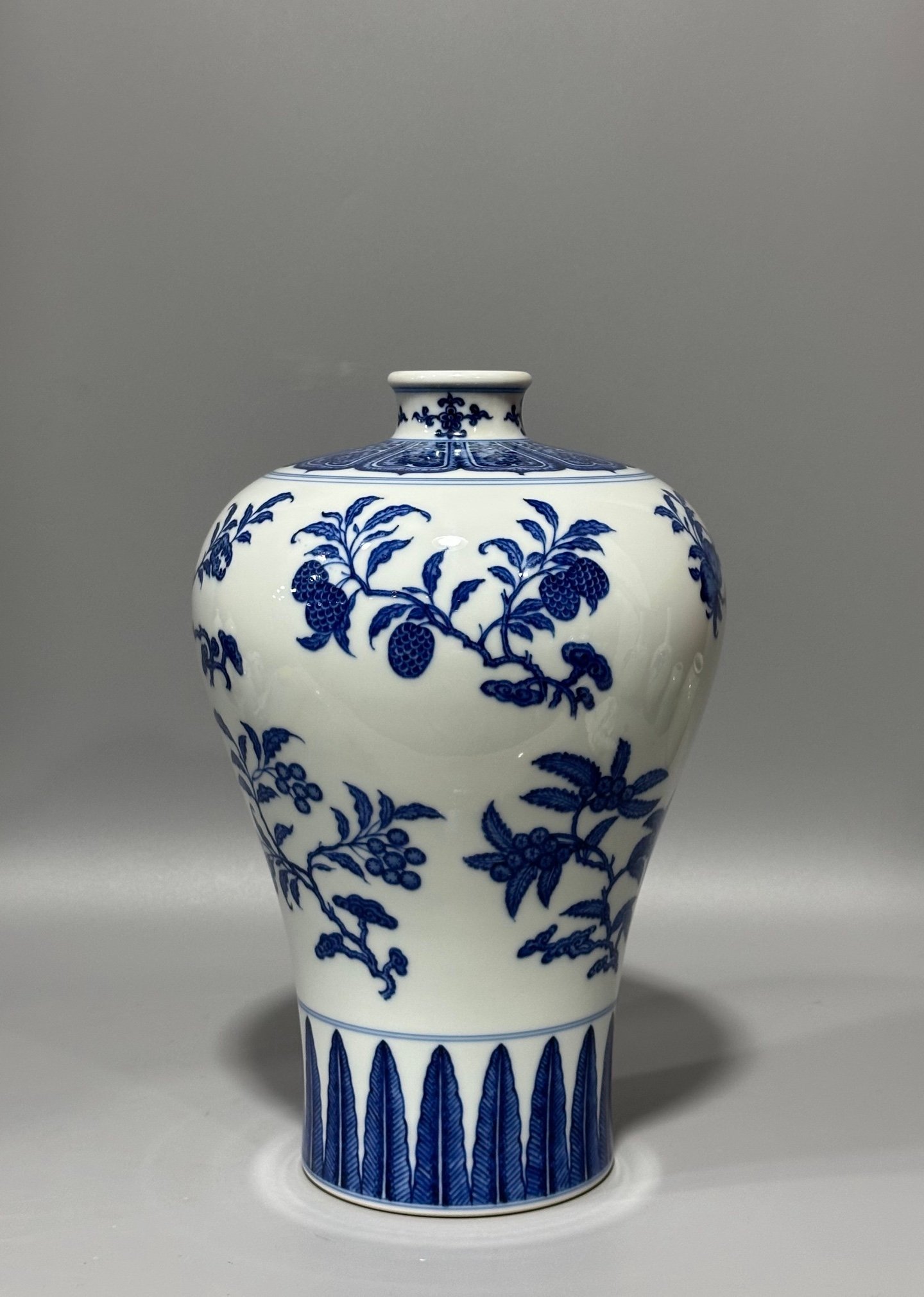 Qing Dynasty Qianlong blue and white plum vase