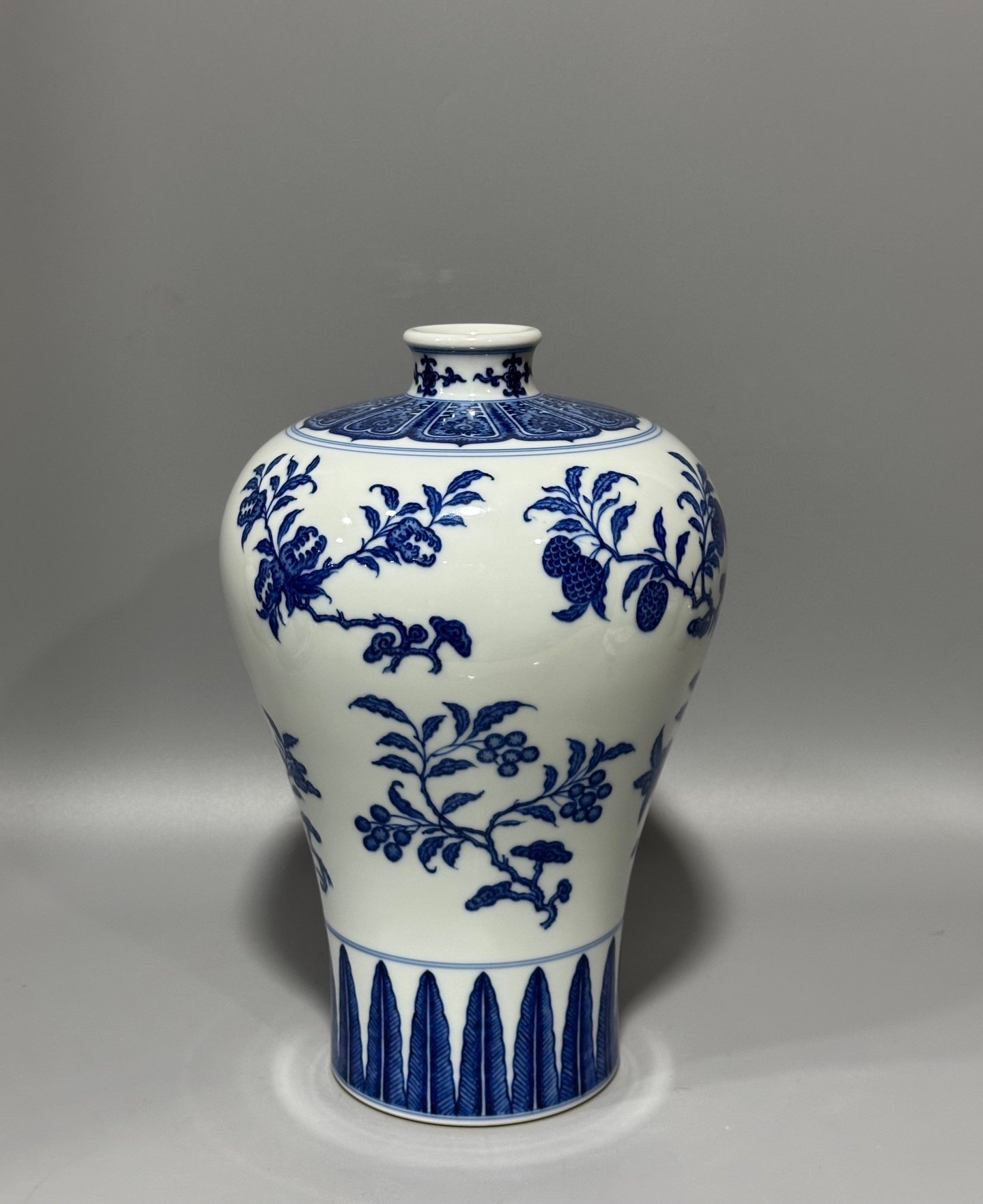 Qing Dynasty Qianlong blue and white plum vase