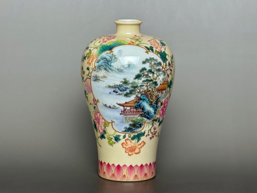 Qing Dynasty Yongzheng ivory yellow ground with hundred landscape window golden plum vase