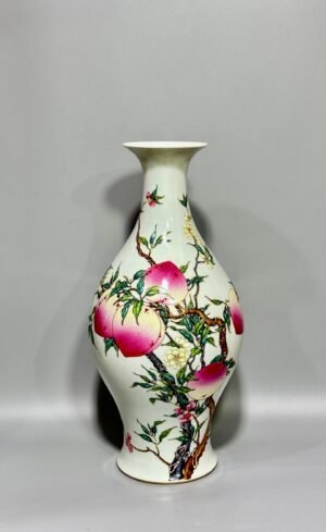 Qing Dynasty Yongzheng this pastel nine-peach olive vase
