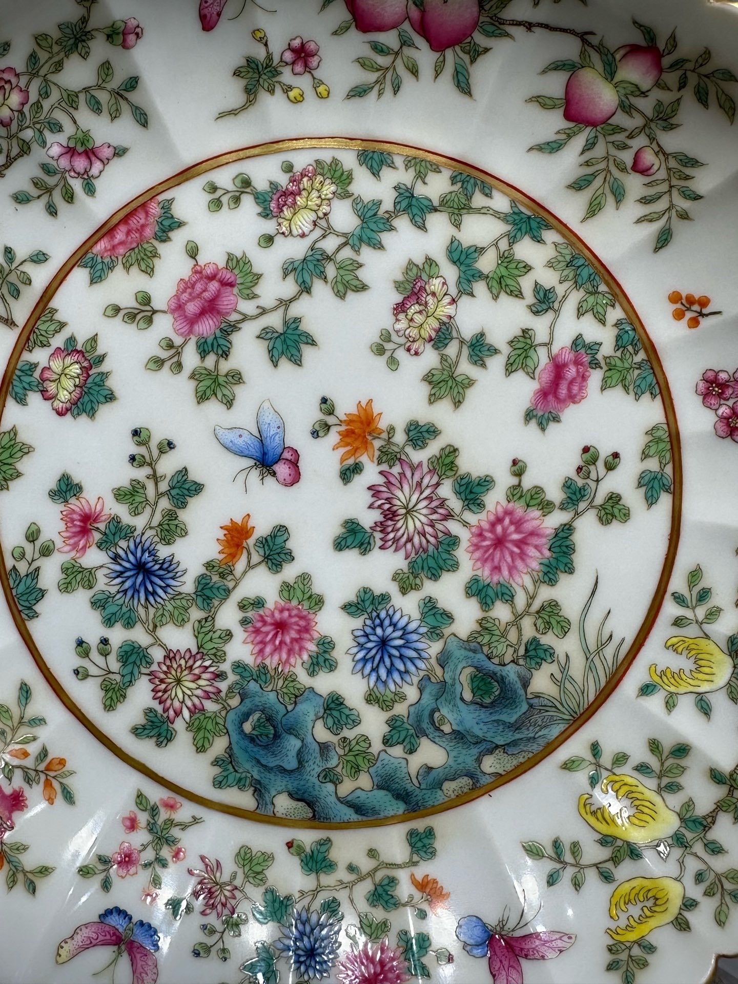 Qing Dynasty Yongzheng pink-colored butterfly plate