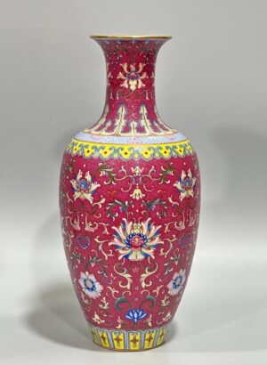 Qing Dynasty Qianlong enamel carmine track passion flower branch Guanyin vase
