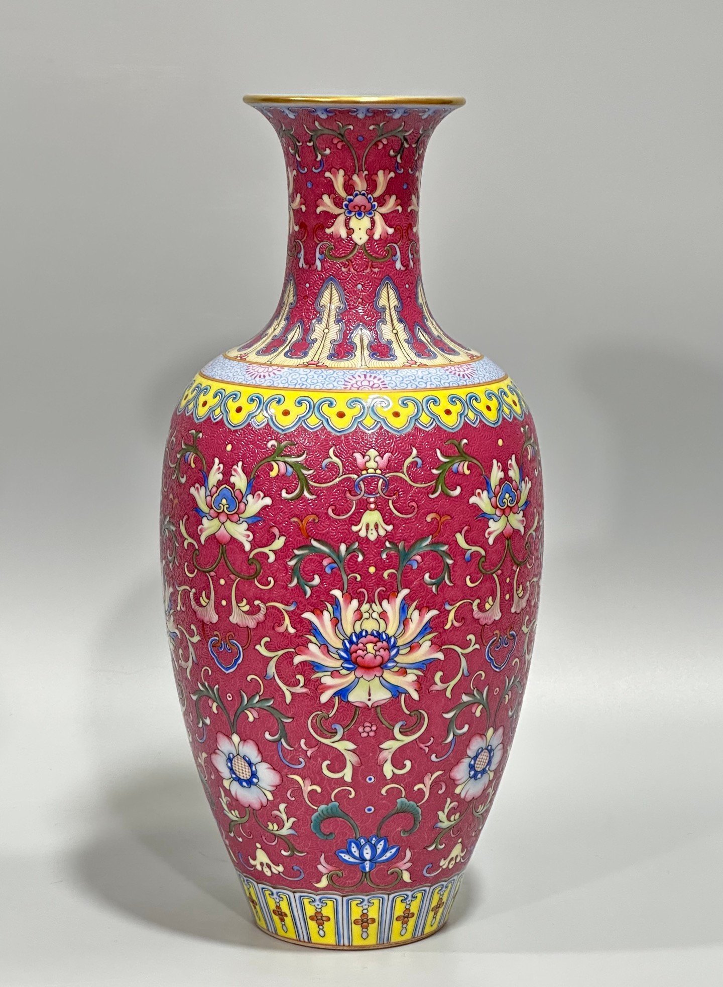 Qing Dynasty Qianlong enamel carmine track passion flower branch Guanyin vase