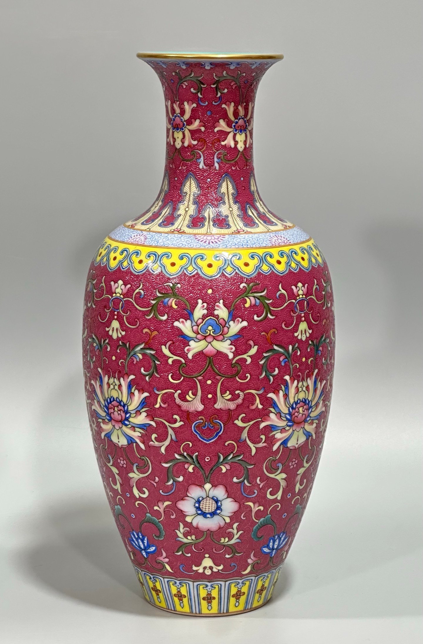 Qing Dynasty Qianlong enamel carmine track passion flower branch Guanyin vase