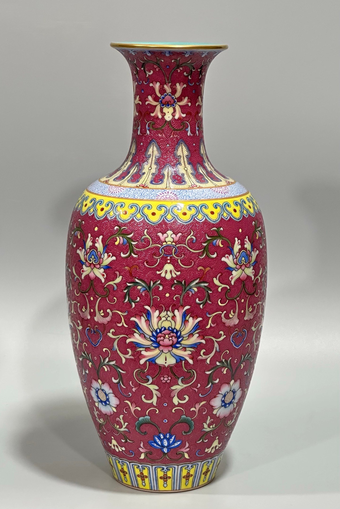Qing Dynasty Qianlong enamel carmine track passion flower branch Guanyin vase