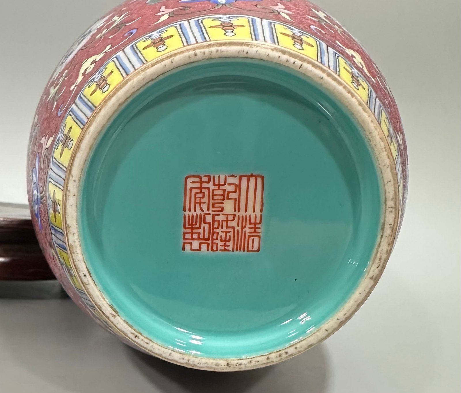 Qing Dynasty Qianlong enamel carmine track passion flower branch Guanyin vase