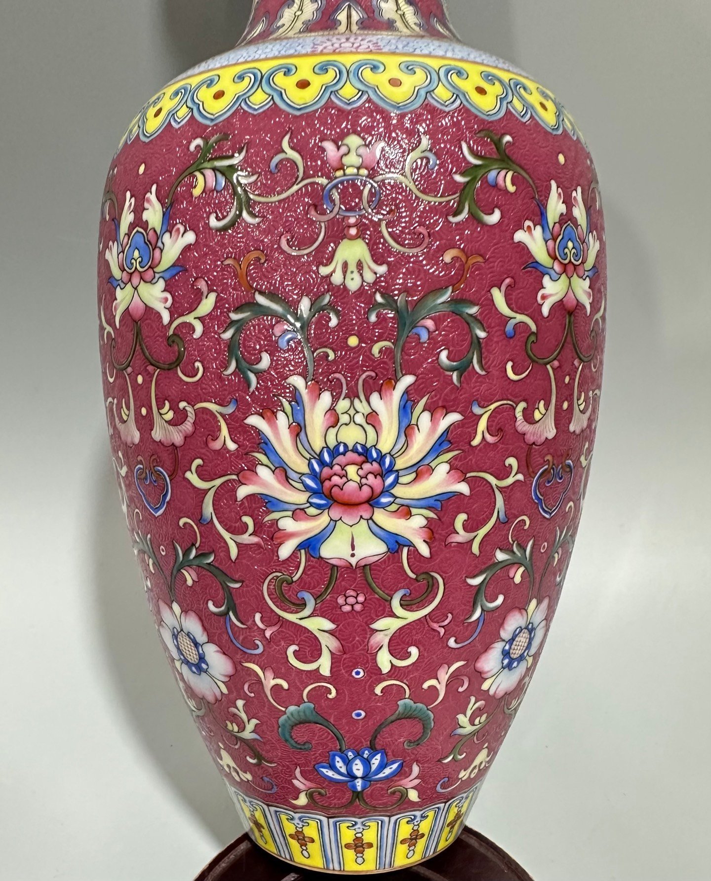 Qing Dynasty Qianlong enamel carmine track passion flower branch Guanyin vase