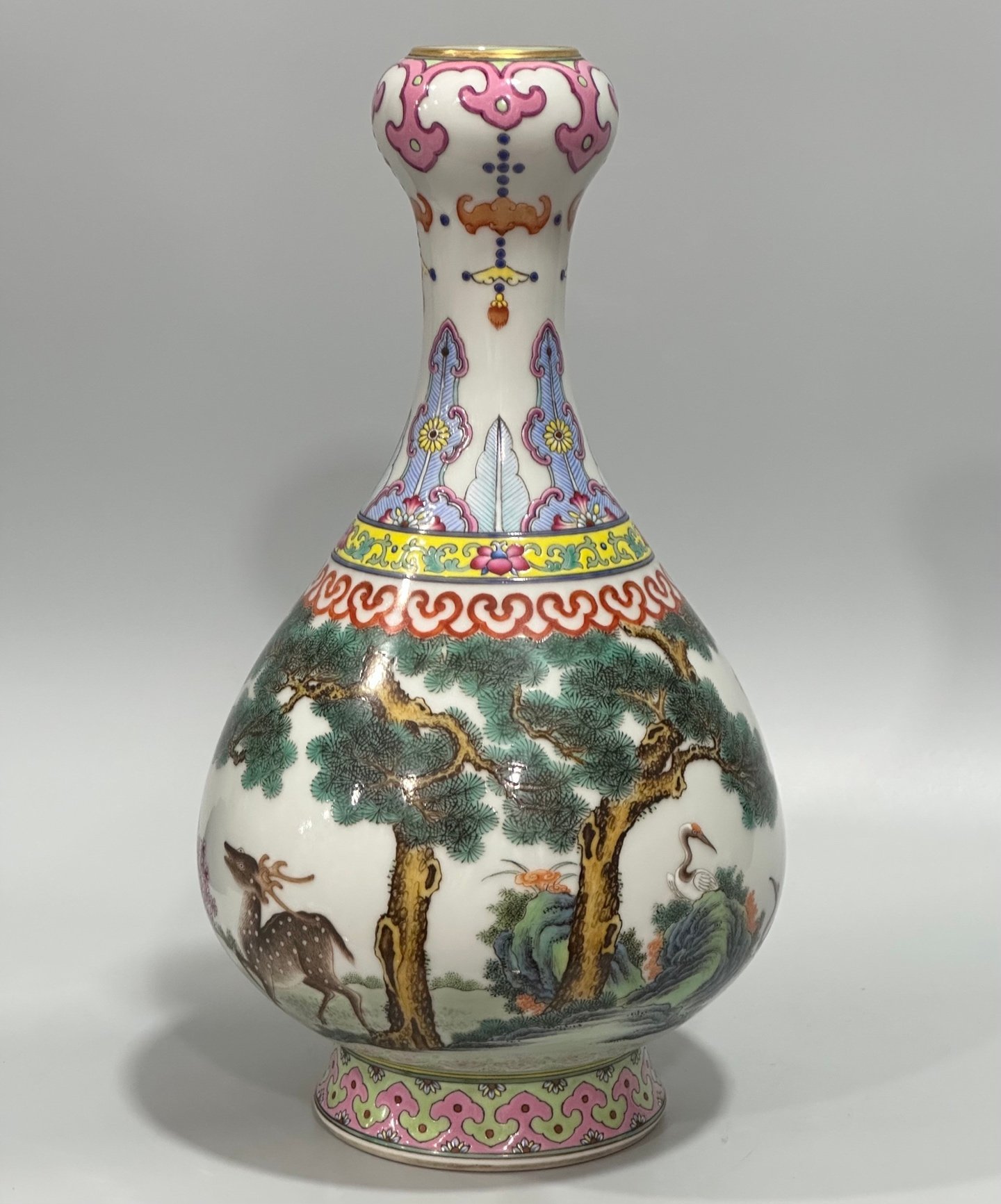 Qing Dynasty Qianlong pastel pine deer and crane garlic vase