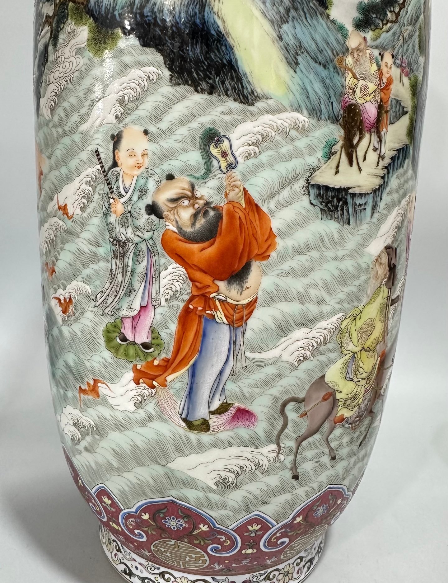 Qing Dynasty Yongzheng enamel vase with rouge tracks on top and bottom depicting gold