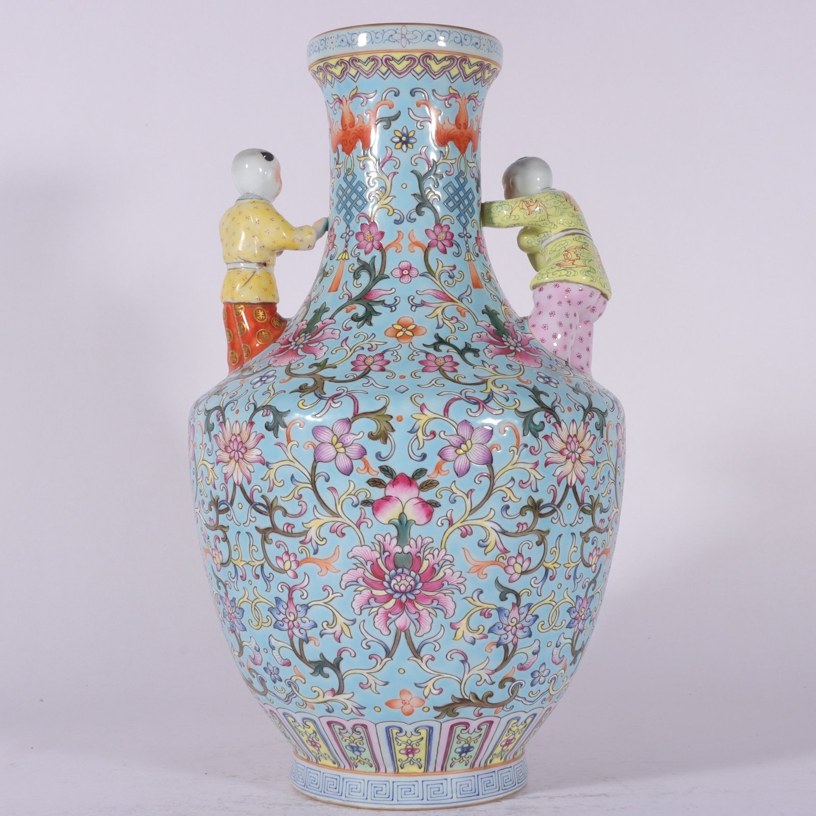Qing Dynasty Qianlong enamel green ground lotus and five-seed Dengke vase