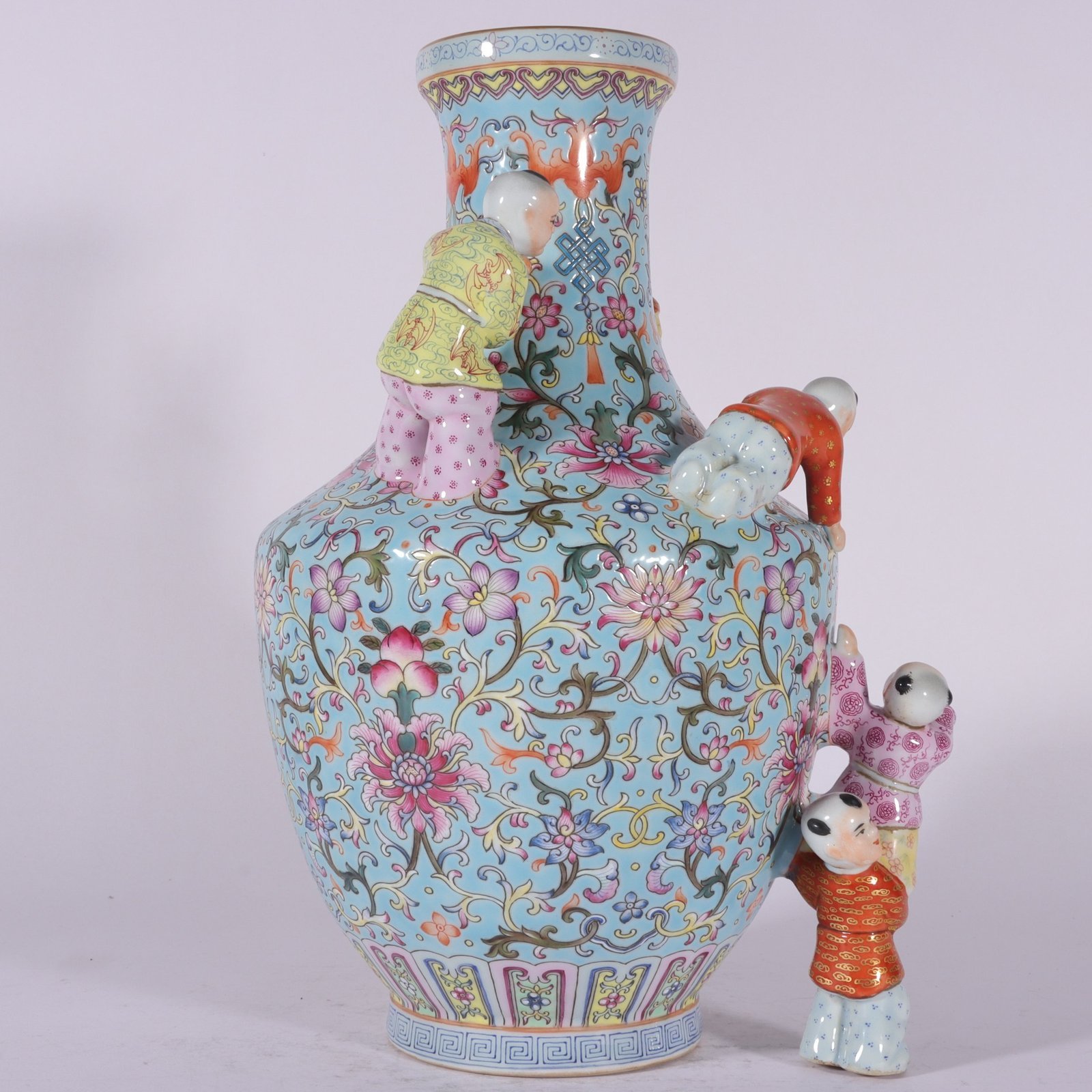 Qing Dynasty Qianlong enamel green ground lotus and five-seed Dengke vase