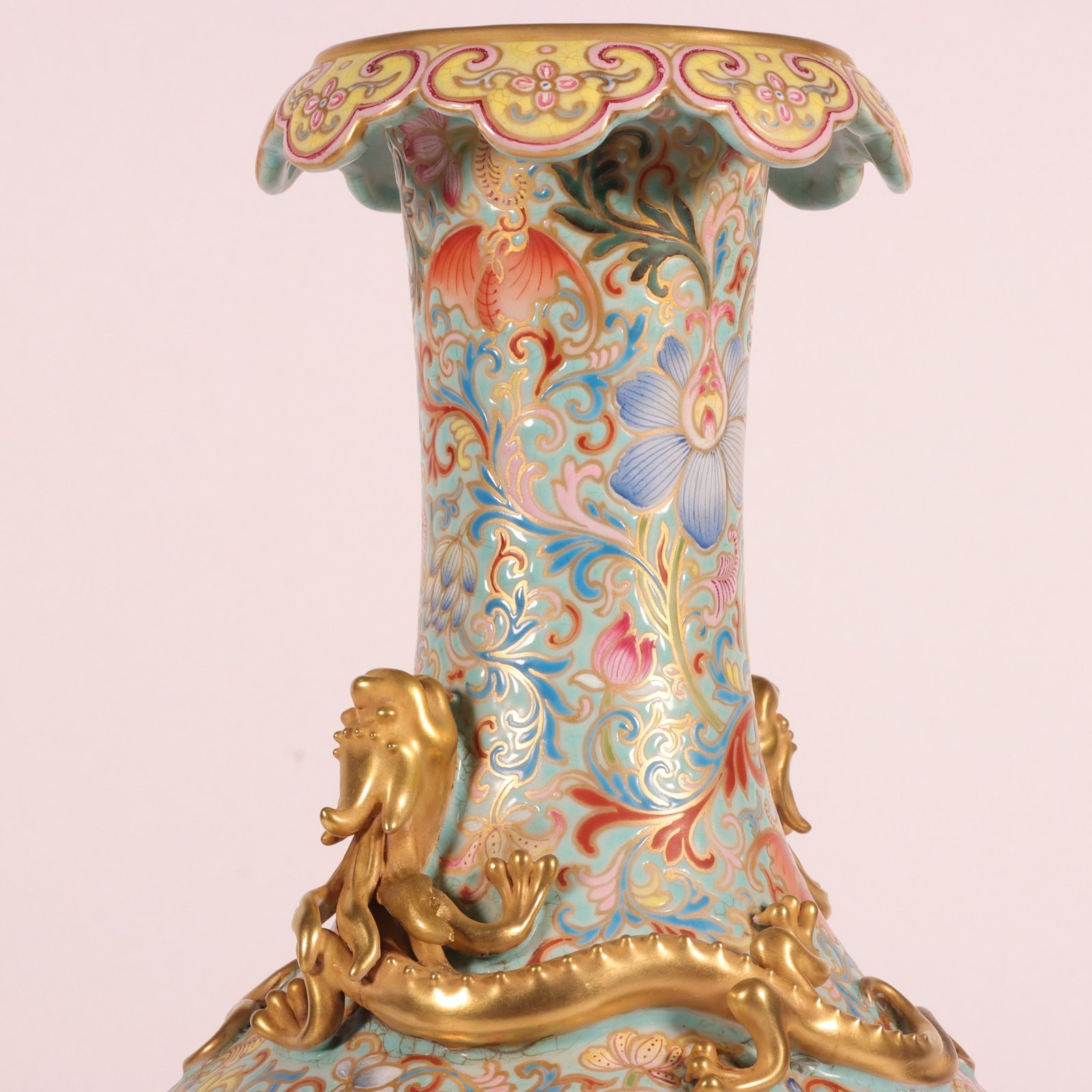 Qing Dynasty Qianlong an enamel-carved and gilded lotus-coiled dragon-turned-mouth bottle