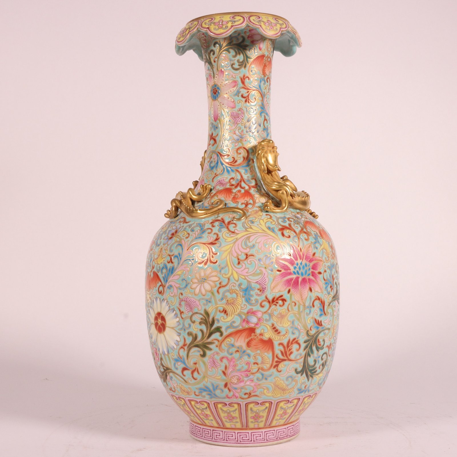 Qing Dynasty Qianlong an enamel-carved and gilded lotus-coiled dragon-turned-mouth bottle