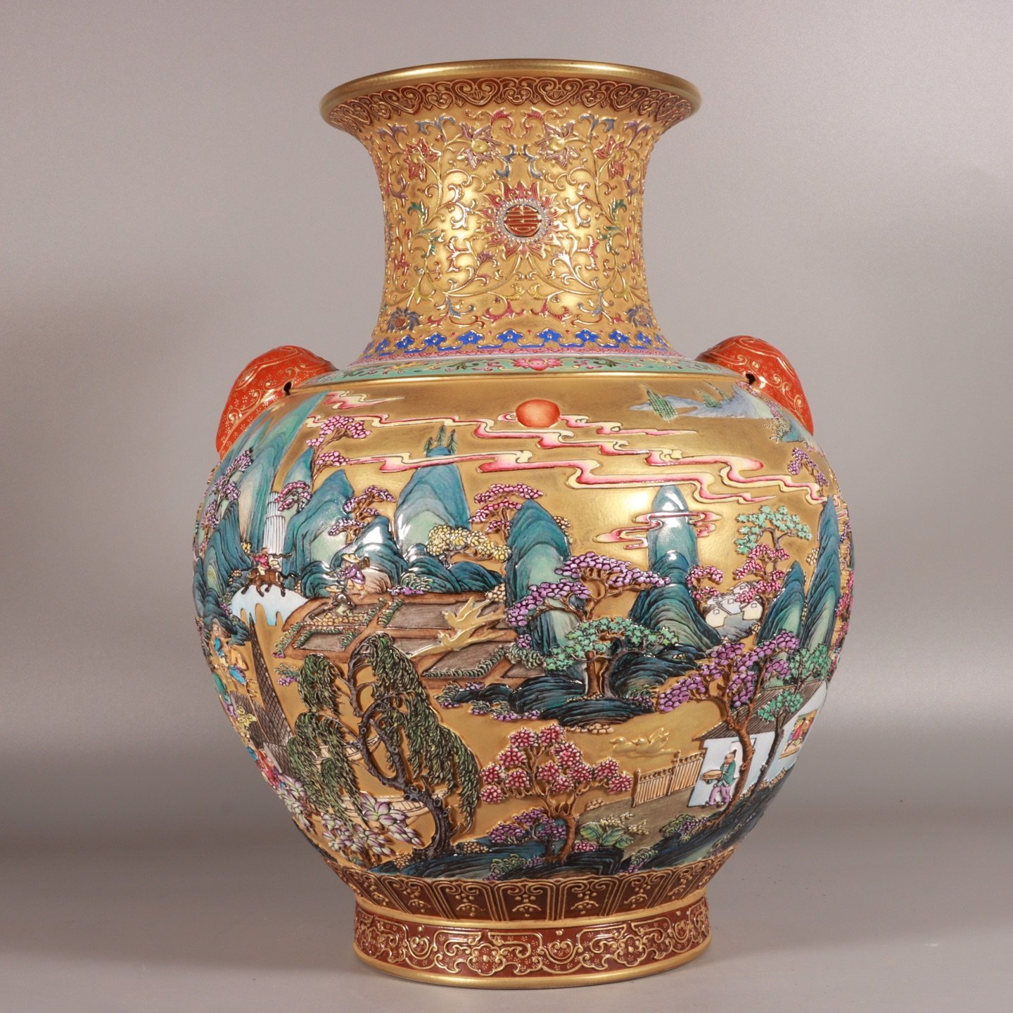 Qing Dynasty Qianlong enamel-carved gold landscape lion-ear vase
