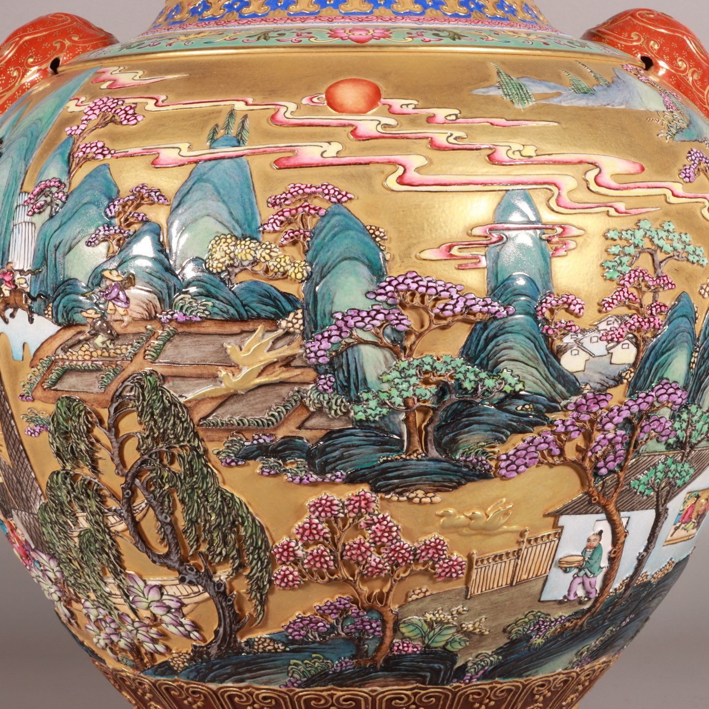 Qing Dynasty Qianlong enamel-carved gold landscape lion-ear vase