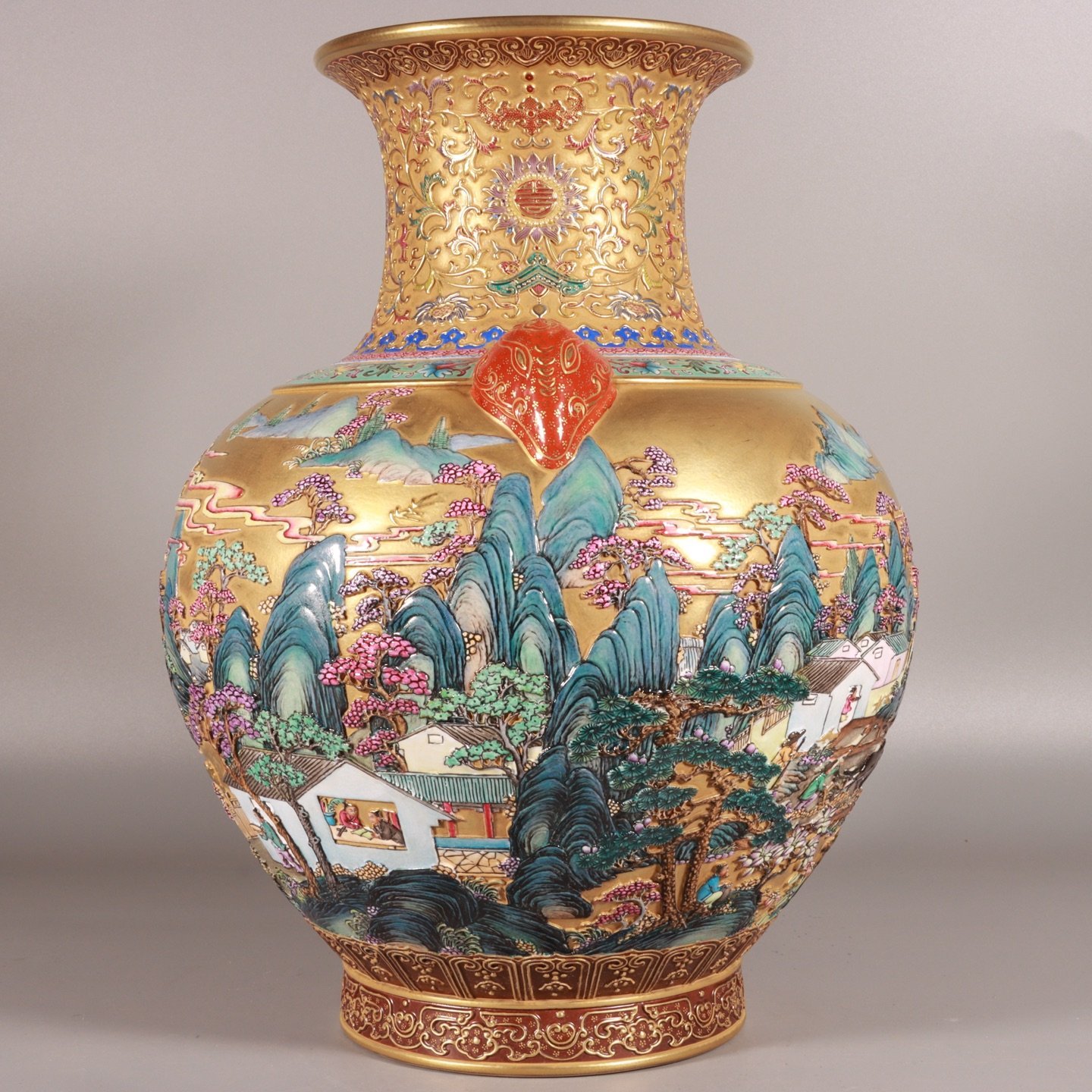 Qing Dynasty Qianlong enamel-carved gold landscape lion-ear vase