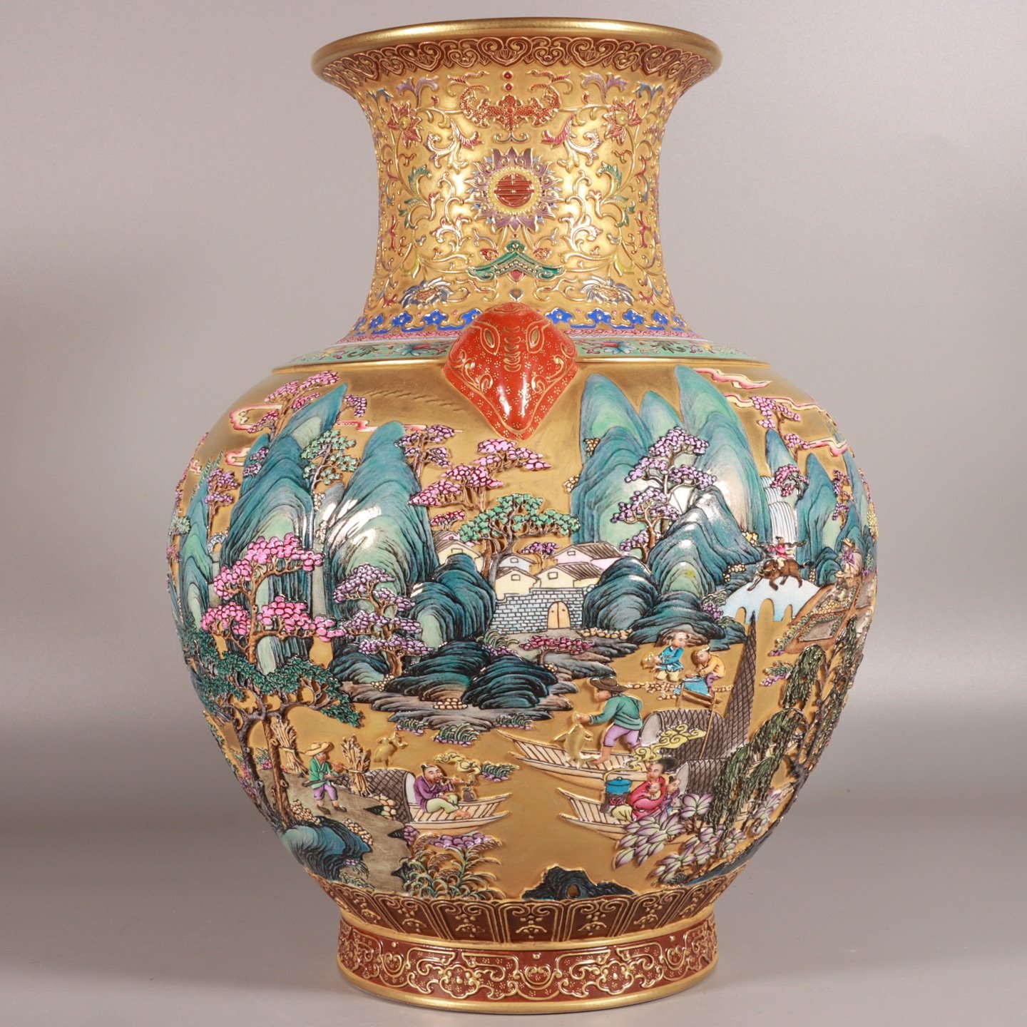 Qing Dynasty Qianlong enamel-carved gold landscape lion-ear vase