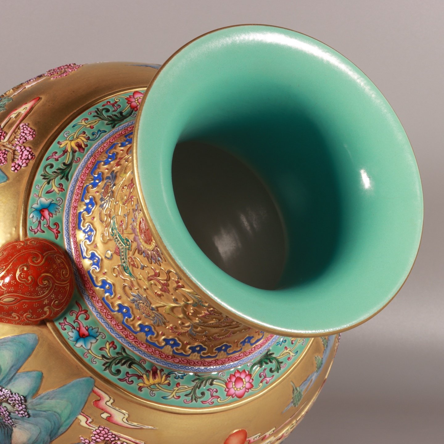 Qing Dynasty Qianlong enamel-carved gold landscape lion-ear vase