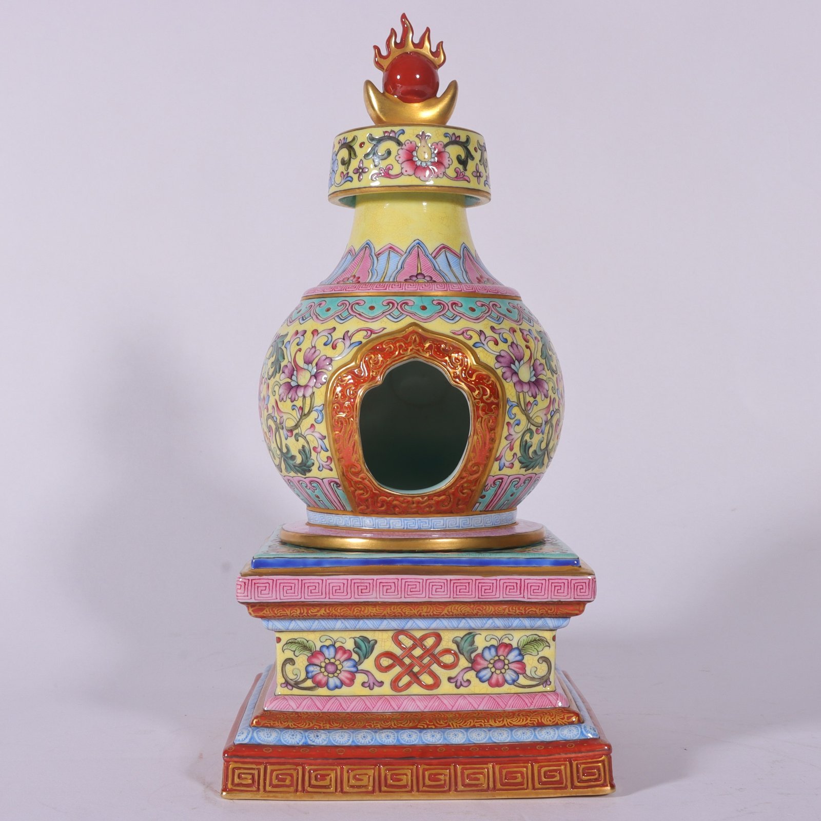 Qing Dynasty Qianlong an enamel pagoda depicting lotuses on yellow ground