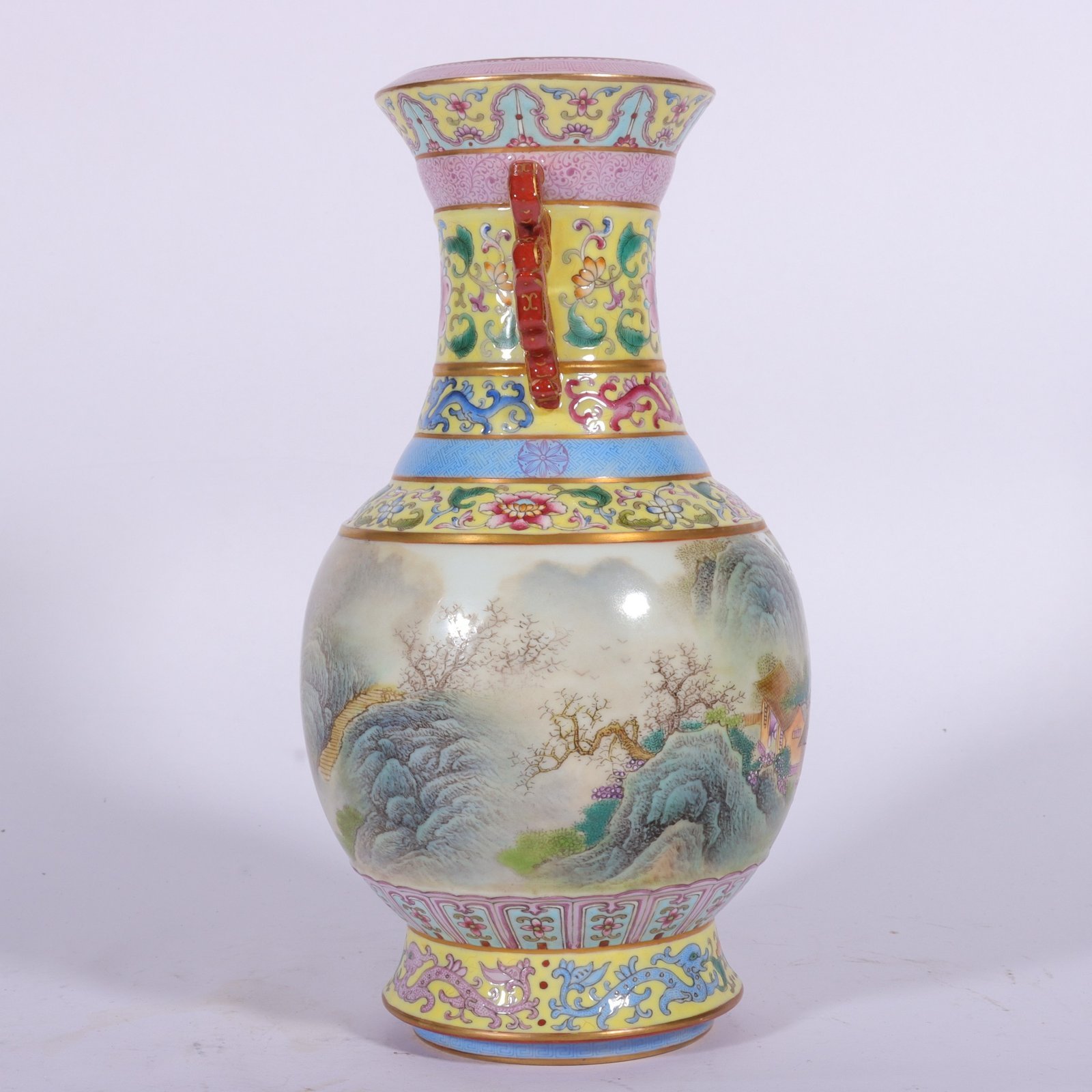 Qing Dynasty Qianlong enamel yellow ground landscape amphora