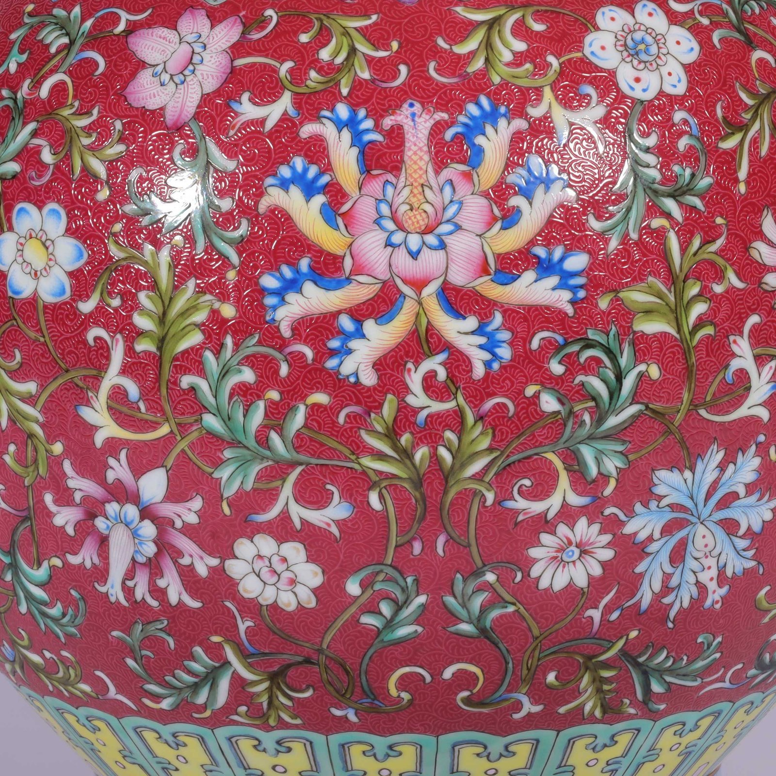 Qing Dynasty Qianlong famille rose and rouge red lotus and lion ear vase