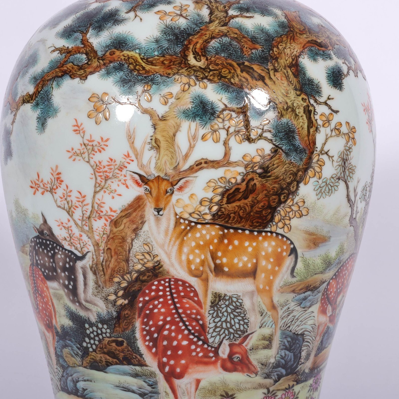 Qing Dynasty Qianlong enamel vase with deer plum blossoms