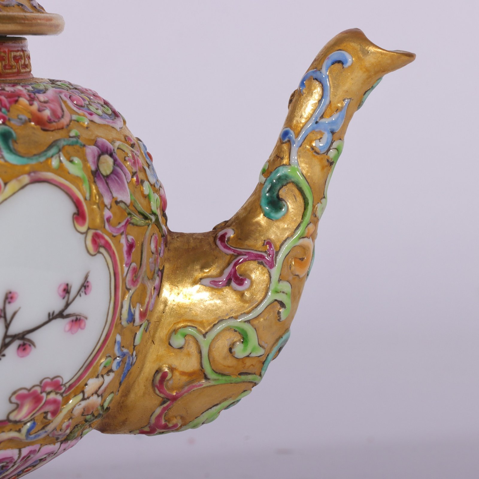 Qing Dynasty Qianlong enamel-carved gilded lotus flower and bird vase with window