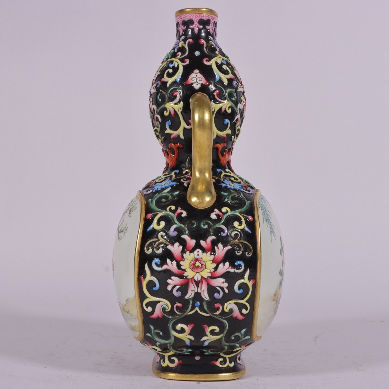 Qing Dynasty Qianlong enamel-colored gourd vase with lotus branches