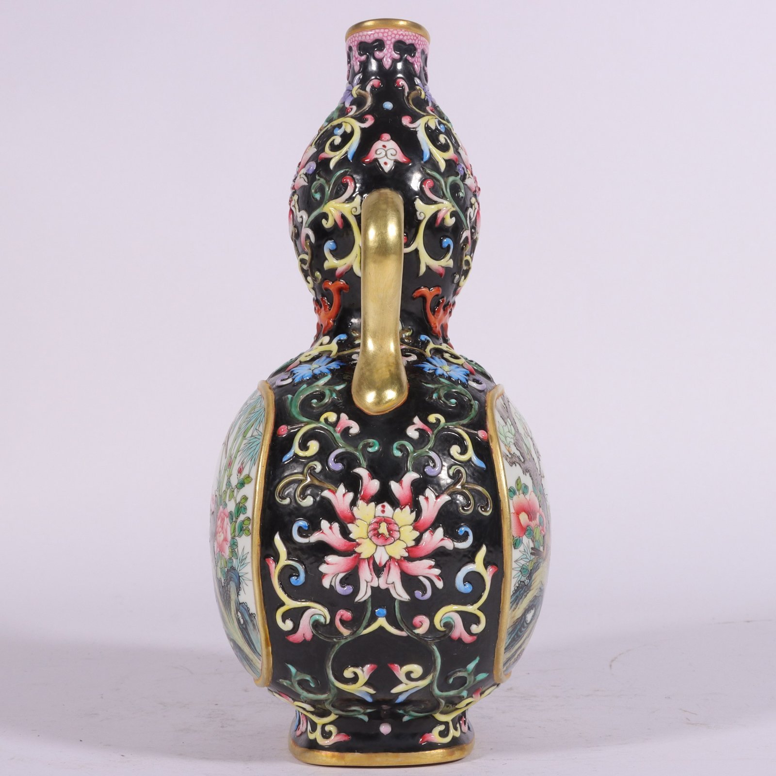 Qing Dynasty Qianlong enamel-colored gourd vase with lotus branches