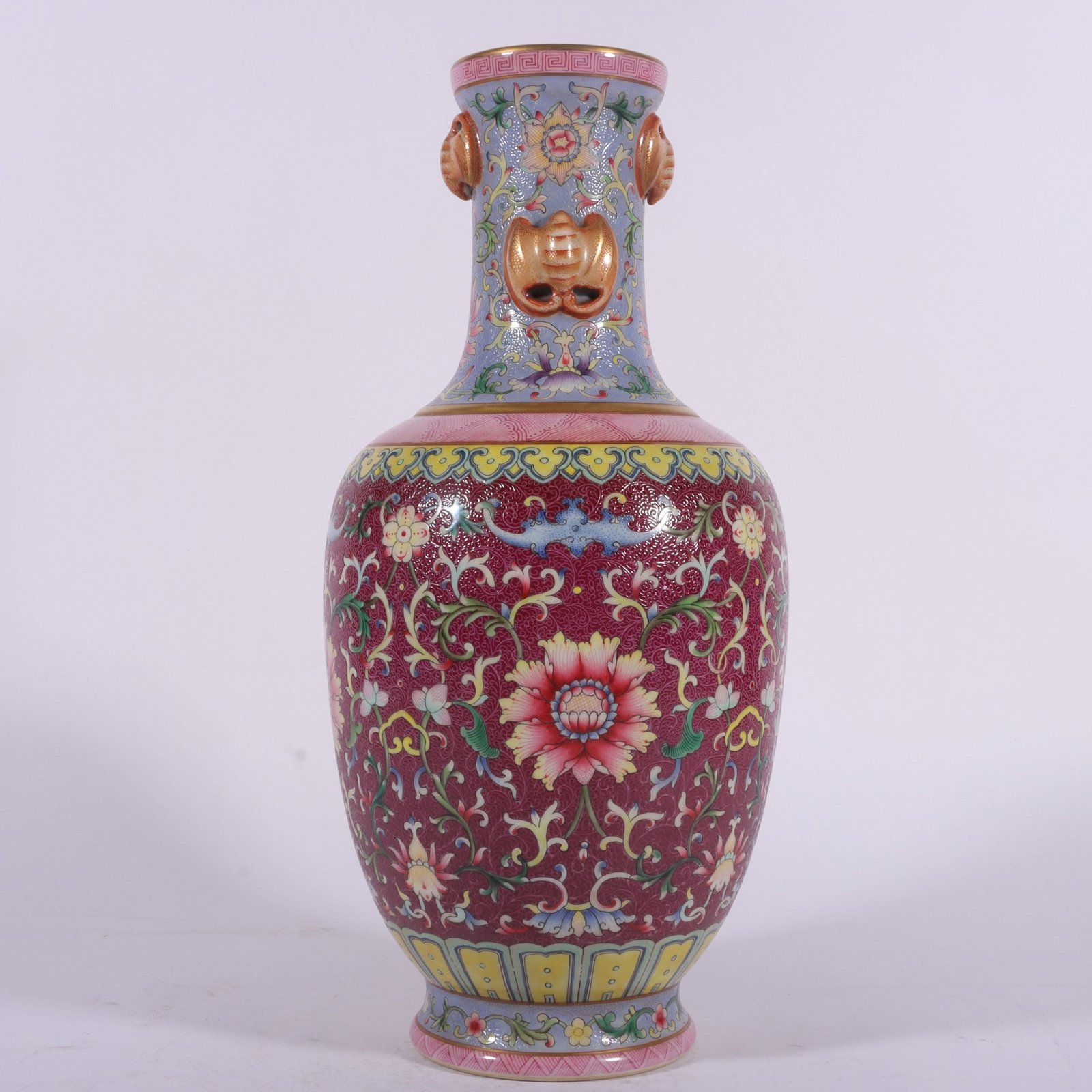 Qing Dynasty Qianlong famille rose rouge red rolled lotus four-ear vase