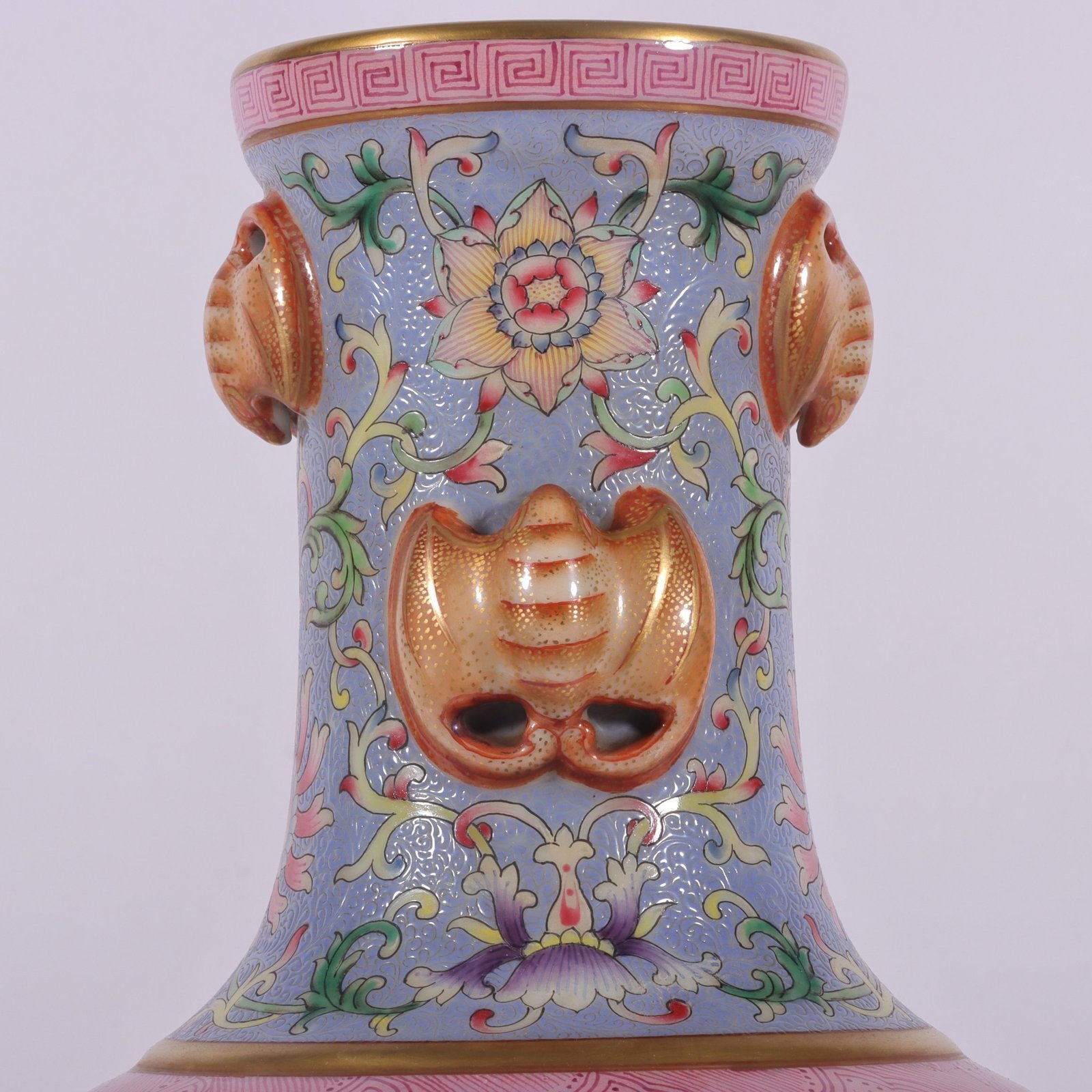 Qing Dynasty Qianlong famille rose rouge red rolled lotus four-ear vase