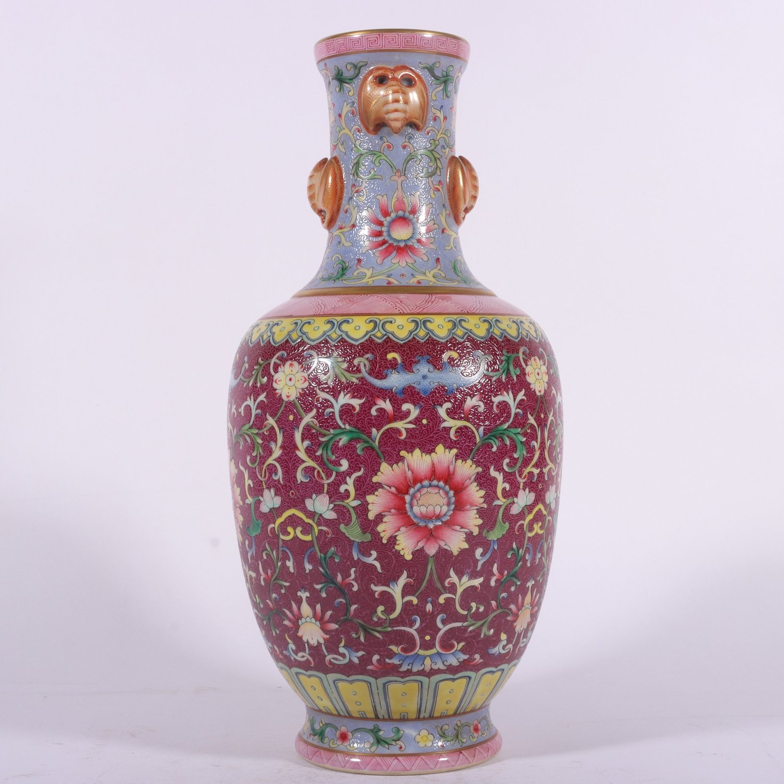 Qing Dynasty Qianlong famille rose rouge red rolled lotus four-ear vase