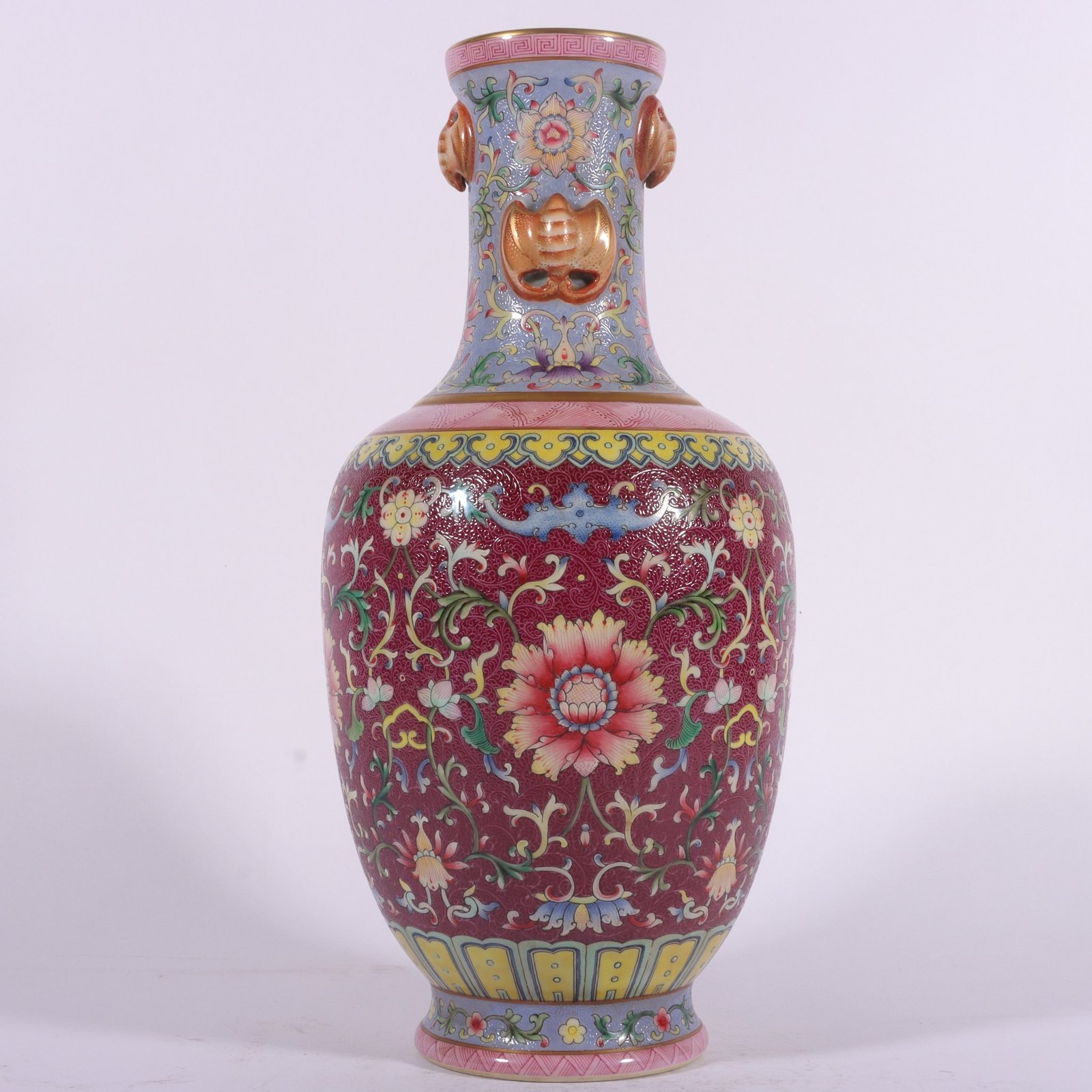 Qing Dynasty Qianlong famille rose rouge red rolled lotus four-ear vase