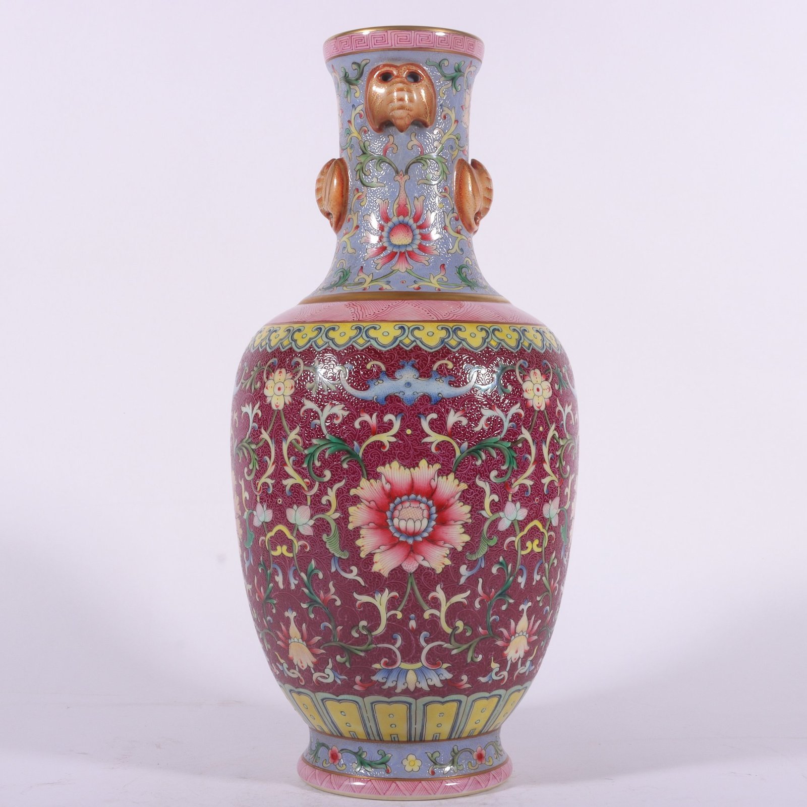 Qing Dynasty Qianlong famille rose rouge red rolled lotus four-ear vase