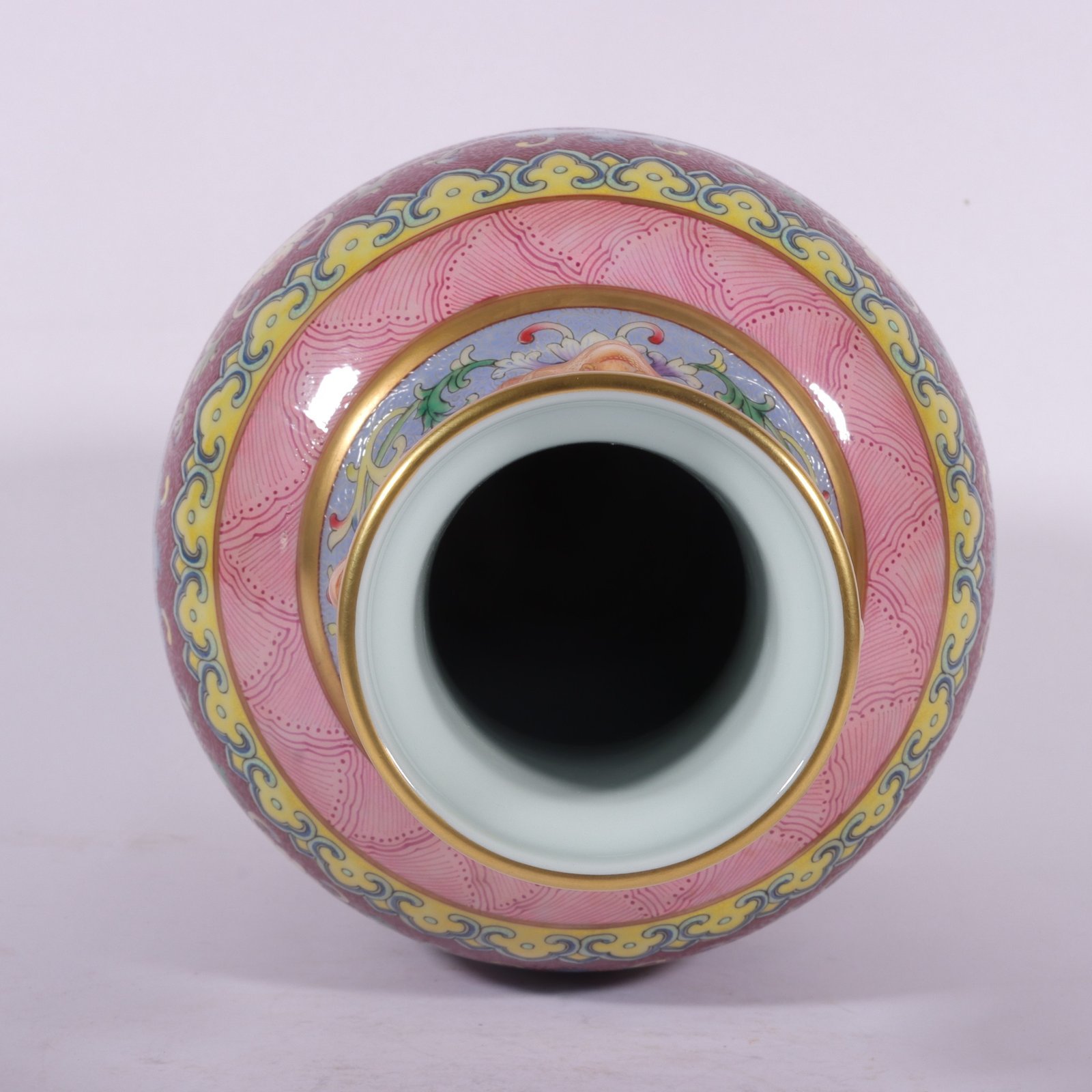 Qing Dynasty Qianlong famille rose rouge red rolled lotus four-ear vase